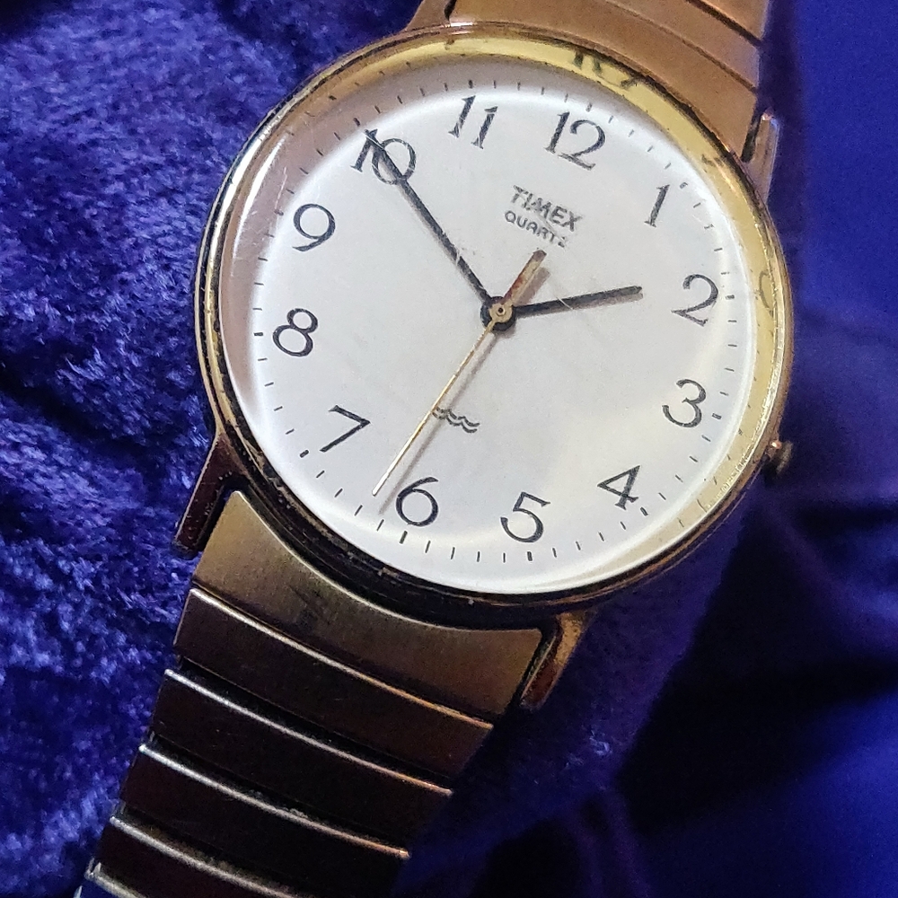 Timex vintage quartz gold tone men's watch